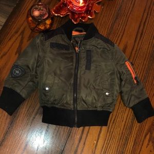 Size 2T army green bomber jacket.